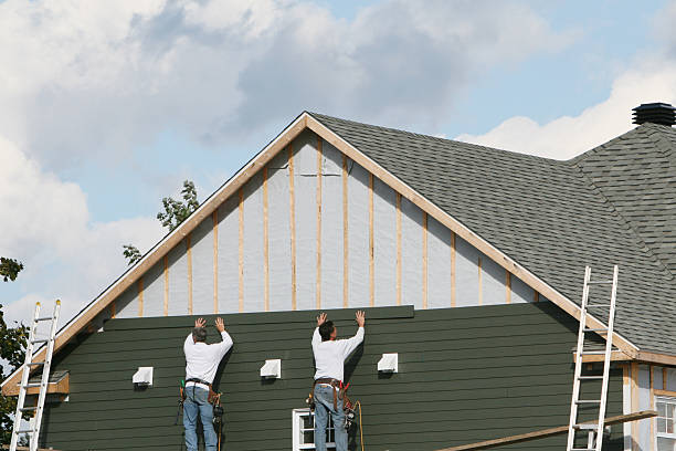 Professional Siding Contractor technician working in Johnstown, CO